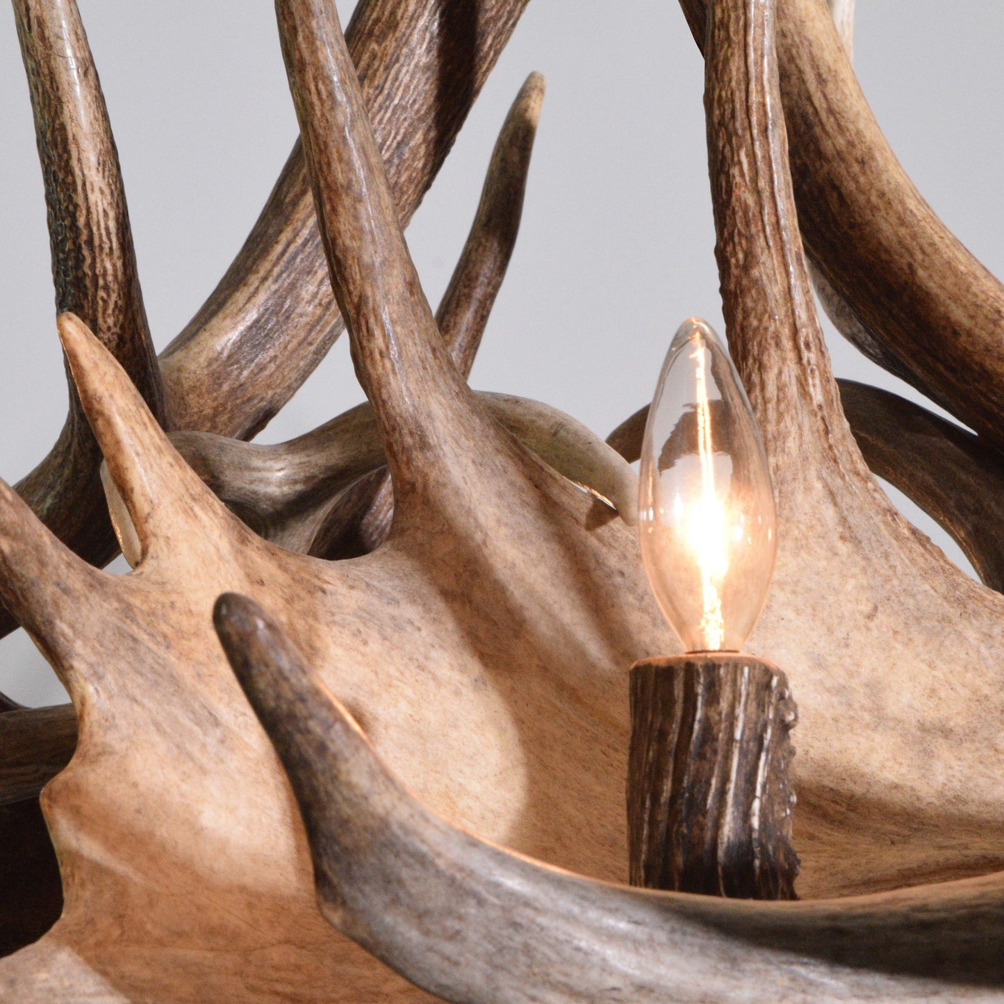 The Jenny Lake Antler Chandelier is crafted near Jackson Hole, Wyoming from naturally dropped elk, moose, and deer antlers.