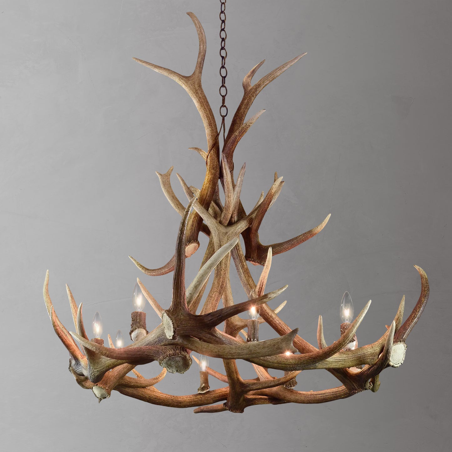 The Teton Antler Chandelier is a stunning design reaching around 60 inches in height. The highlight is an open halo base crafted from large elk antlers rising up to a spectacular peak.