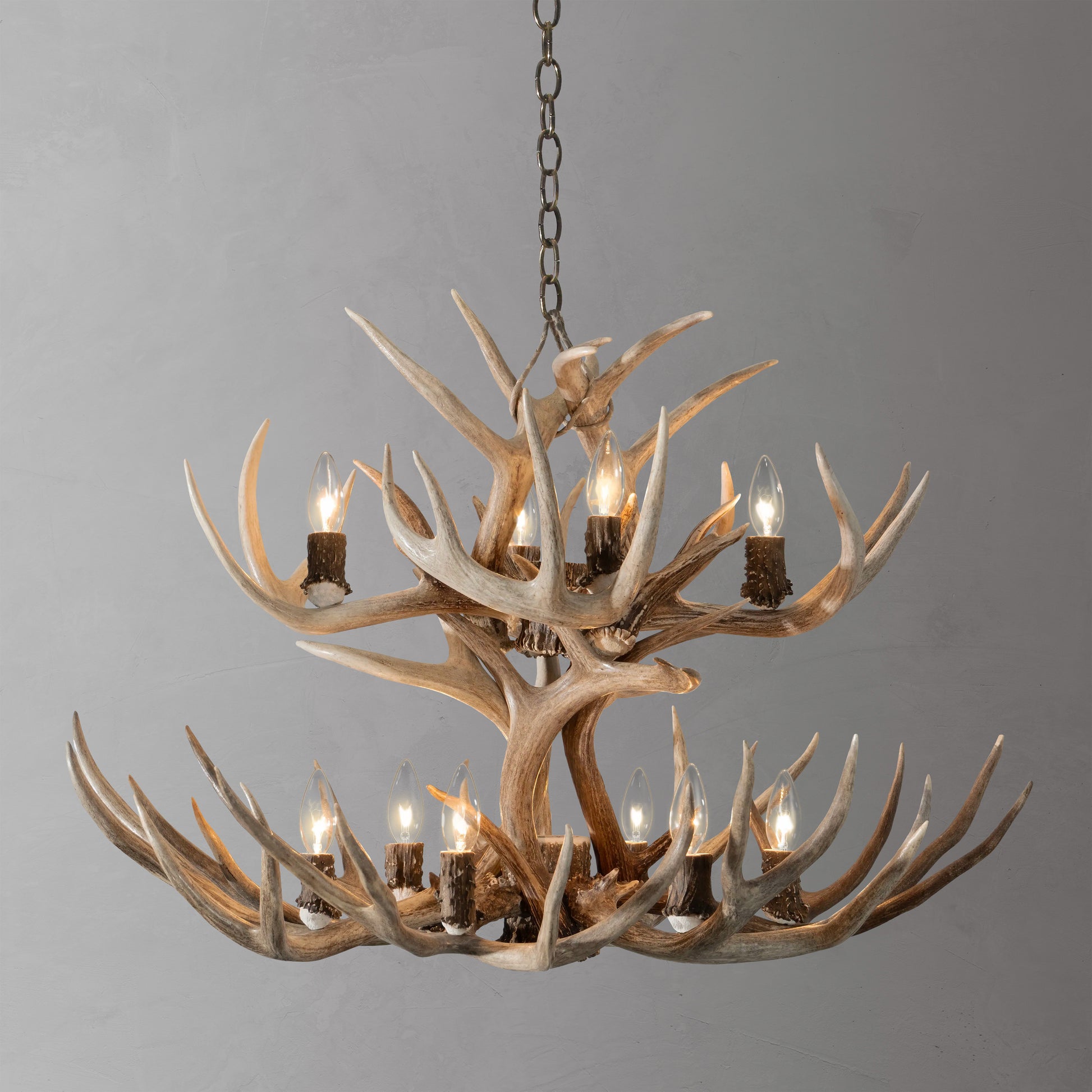 The Two Tier Antler Chandelier is made near Jackson Hole, Wyoming using the very best naturally dropped mule deer antlers for the base and whitetail antlers for the top tier.