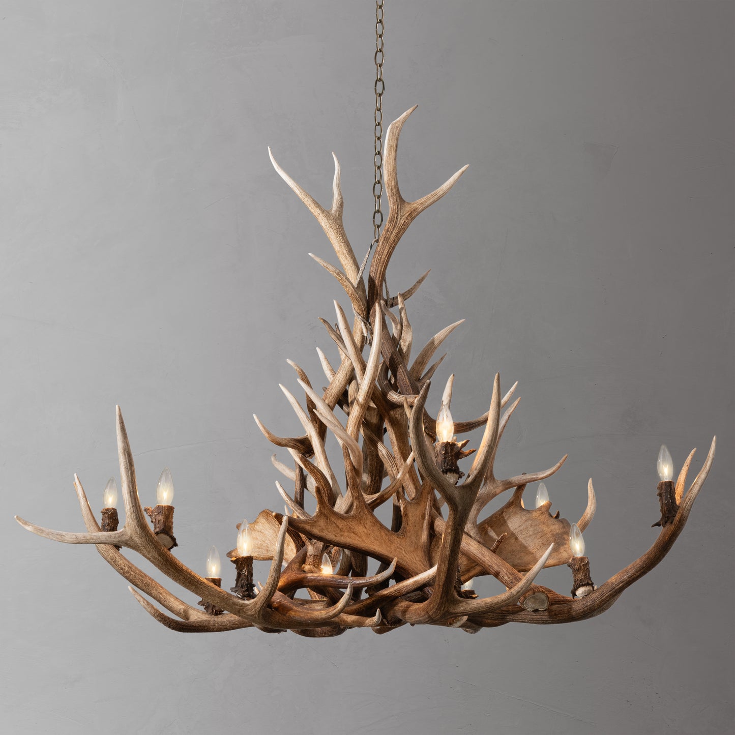 A large antler chandelier crafted from elk, moose, and deer antlers.
