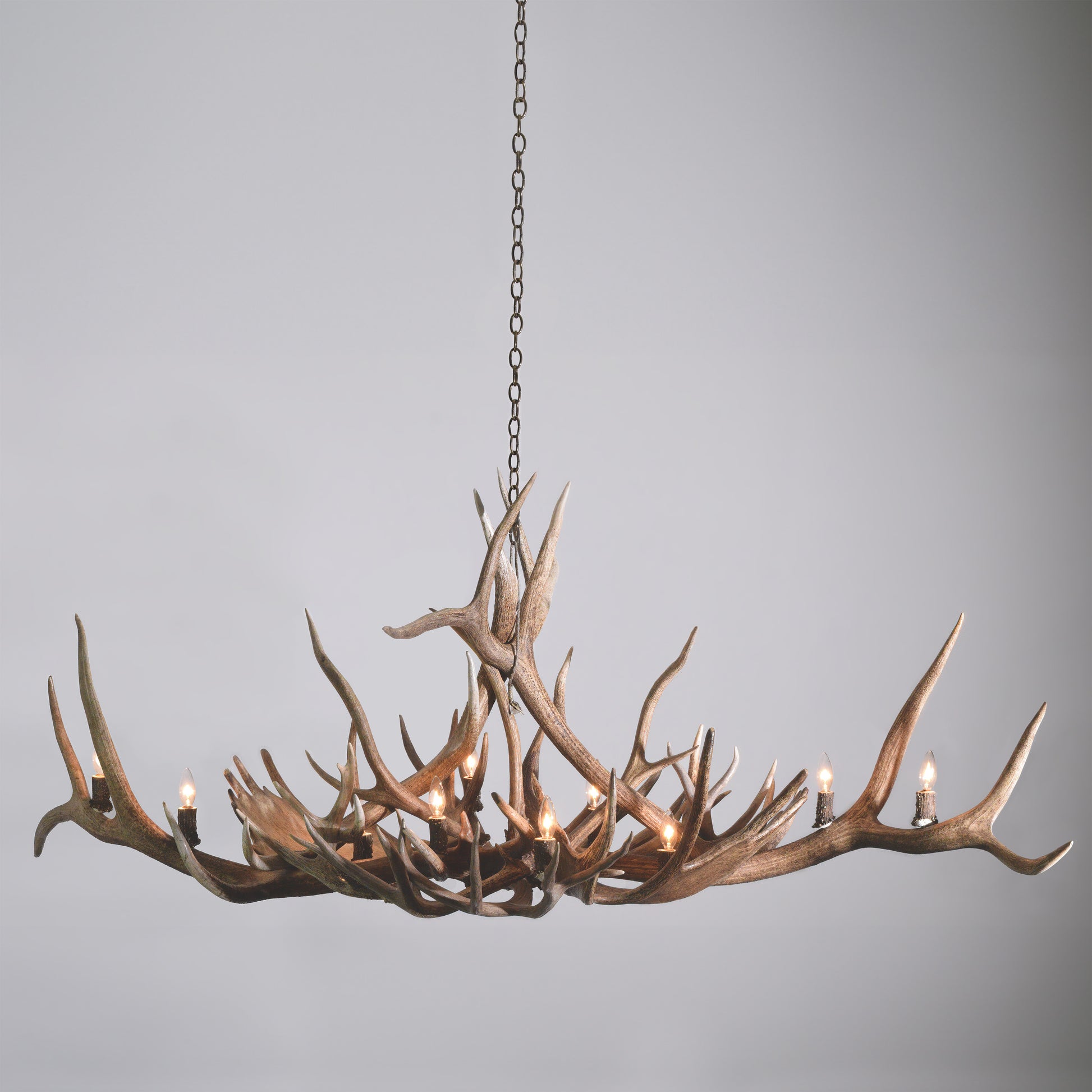 The Hayden Valley Antler Chandelier is crafted near Jackson Hole, Wyoming from large elk, moose, and deer antlers and measures almost 6 feet wide.