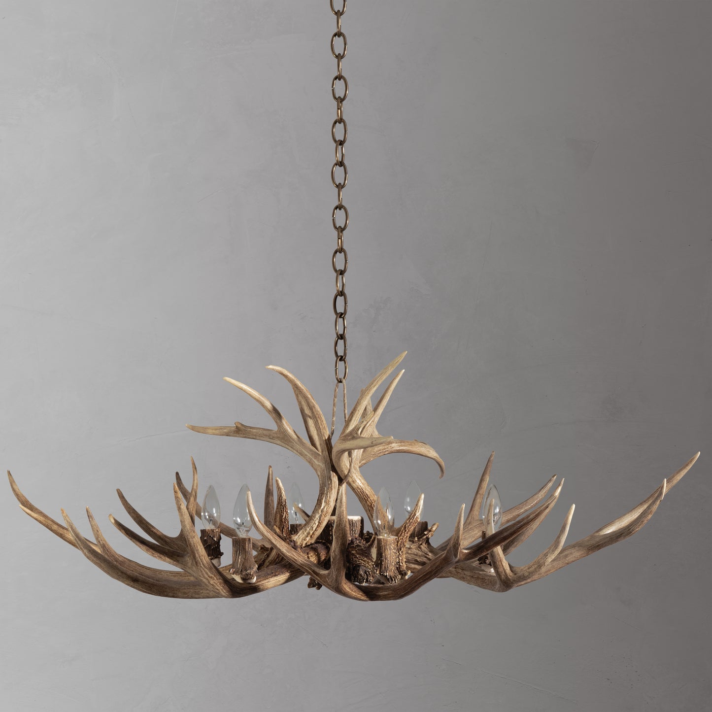 The Ranch Valley Antler Chandelier features 6 lights and is crafted from mule deer antler and whitetail deer antler.